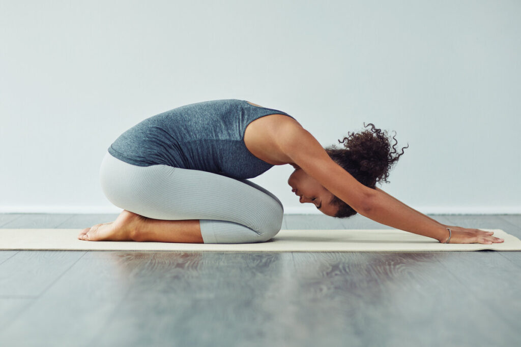 Person using a gentle stretch during sciatica care
