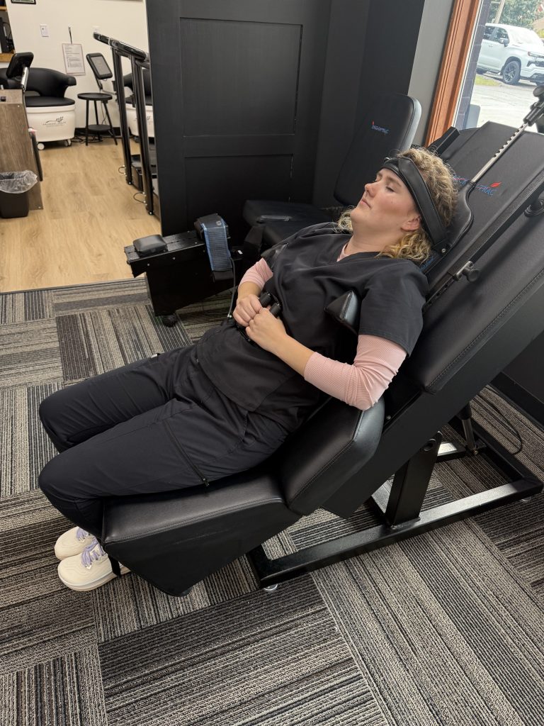 Patient positioned for spinal and cervical decompression treatment