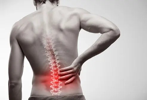 Patient receiving care for back pain at Abundant Health