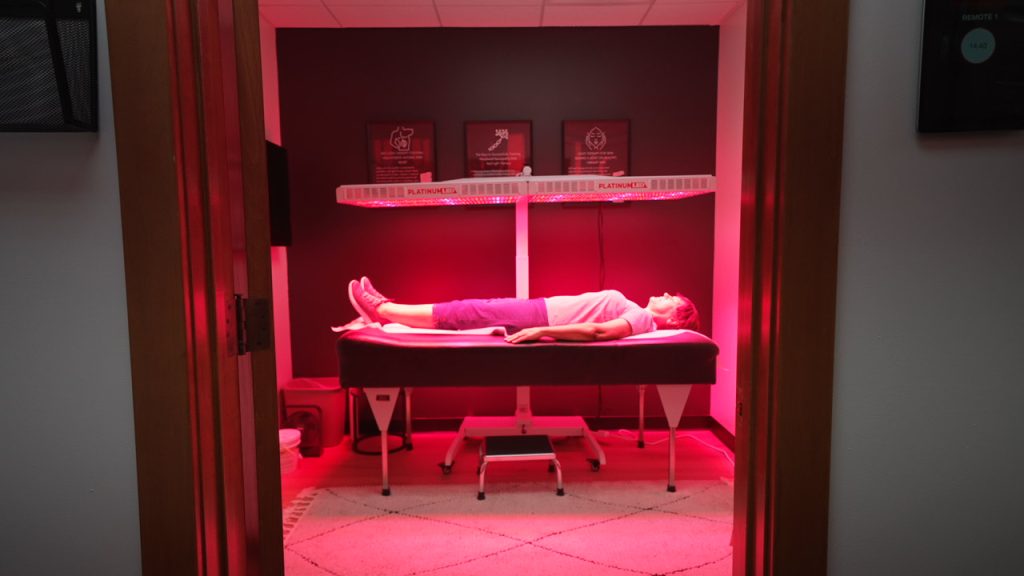 Medical-grade red light therapy treatment room at Abundant Health