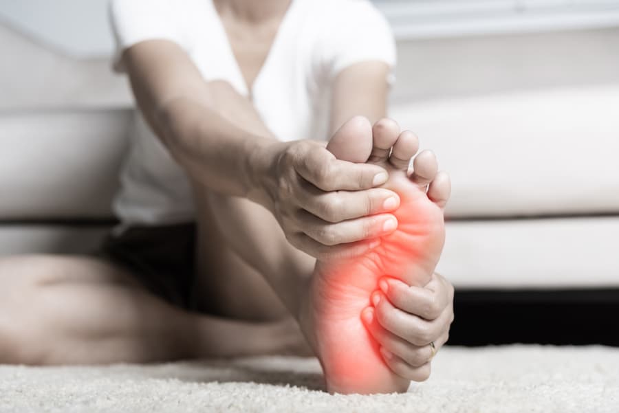 Clinician evaluating foot and ankle movement