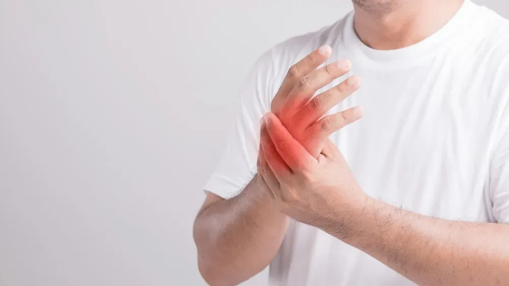 Clinician evaluating hand and wrist function